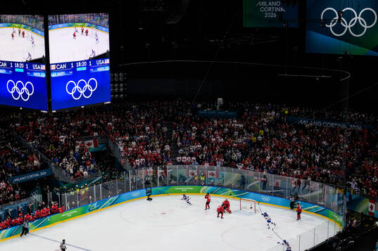 Jack Hughes of USA scores the game-winning 1-2 goal behind