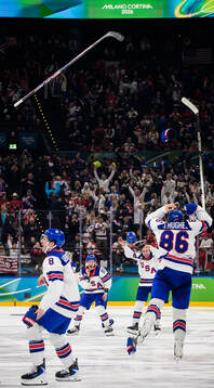 Zach Werenski, Jake Guentzel, Quinn Hughes and Jack Hughes
