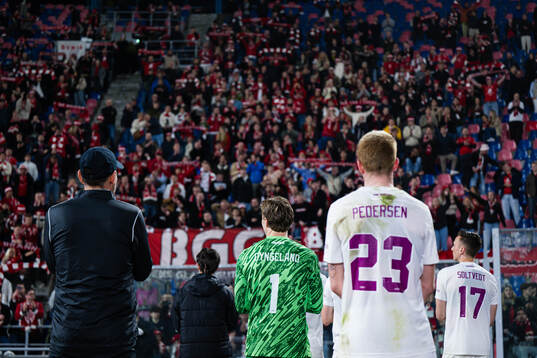 Head coach Freyr Alexandersson, goalkeeper Mathias