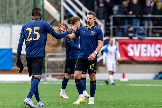 AIKs Ibrahim Cisse och Dino Besirovic jublar