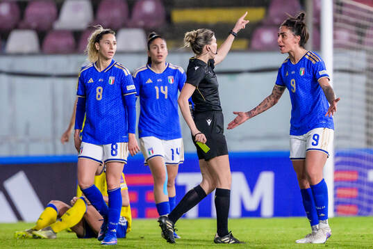 Martina Piemonte of Italy and referee Olatz Rivera Olmedo