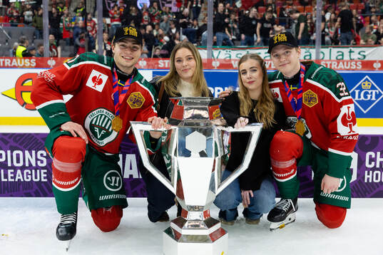 Isac Born and Noah Hasa of Frölunda and their fiancées
