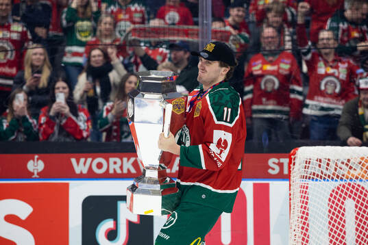 Max Lindholm of Frölunda celebrates with the trophy