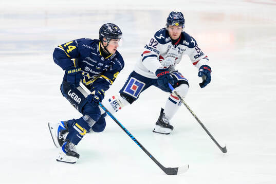 HV71s Hugo Fransson och Linköpings Zion Nybeck