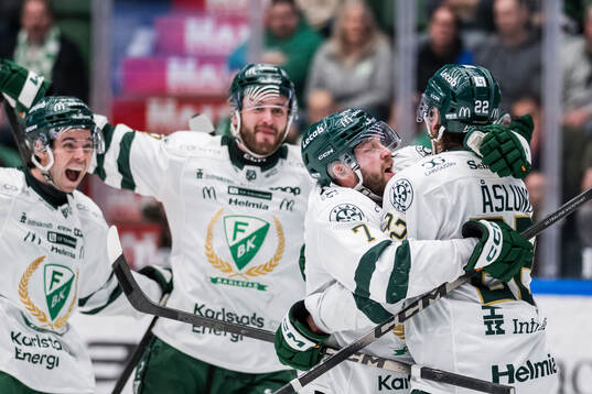 Färjestads Axel Bergkvist och Per Åslund jublar