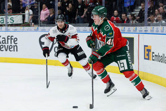 Malmö Redhawks Janne Kuokkanen och Frölundas Ivar Stenberg
