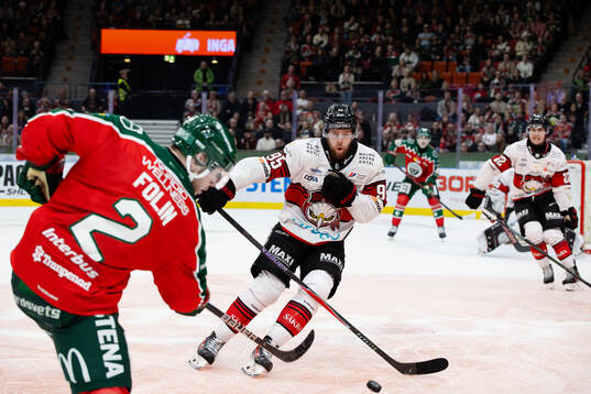 Frölundas Christian Folin och Malmö Redhawks Carl Persson