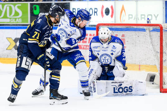 HV71s William Ignberg Nilsson och Leksands Kalle Östman