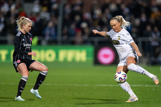 Rebecka Blomqvist of Eintracht Frankfurt and Alva Selerud