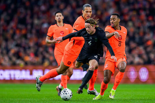 Patrick Berg of Norway against Virgil van Dijk and Ryan