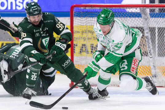 Färjestads David Tomasek och Rögles Fredrik Olofsson