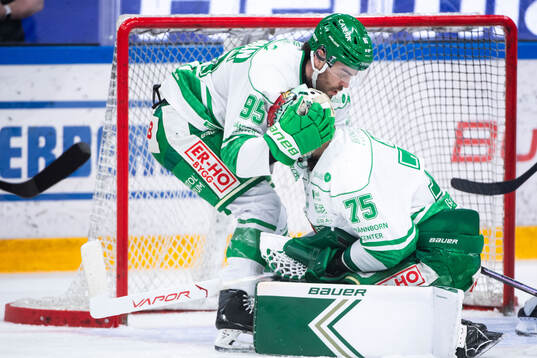 Rögles Mark Friedman och målvakt Arvid Holm jublar