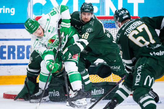 Rögles Karson Kuhlman och Färjestads Filip Roos