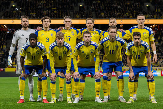 The starting eleven of Sweden pose for a team photo