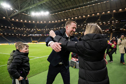 Head coach Graham Potter of Sweden celebrate with family