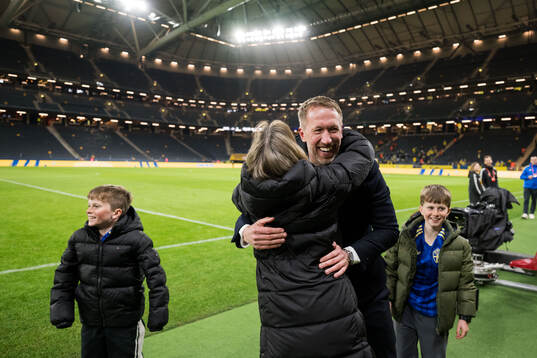 Head coach Graham Potter of Sweden celebrate with family