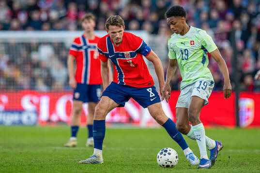 Sander Berge of Norway and Alvyn Sanches of Switzerland