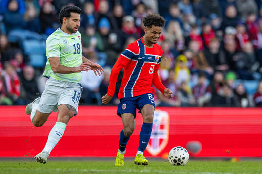 Eray Cömert of Switzerland and Oscar Bobb of Norway