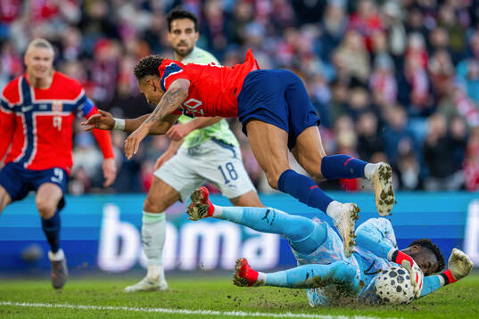 Antonio Nusa of Norway and goalkeeper Yvon Mvogo of