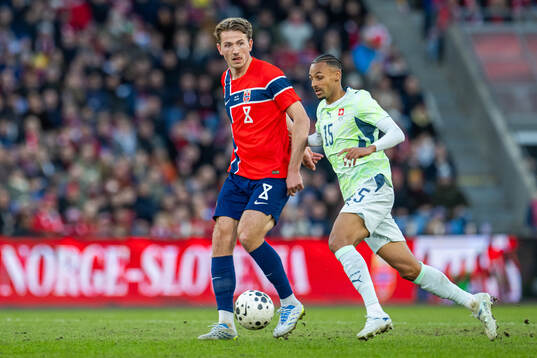 Sander Berge of Norway and Djibril Sow of Switzerland
