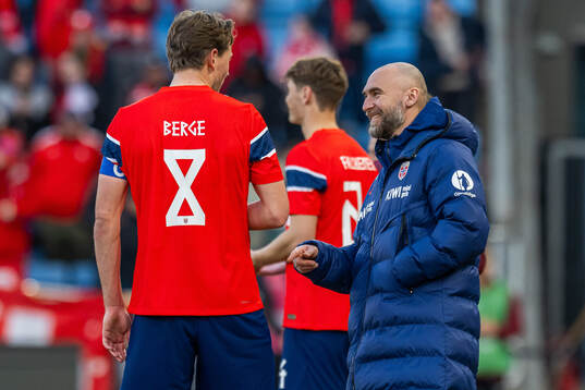 Sander Berge and kit manager Sigurd Ertsås of Norway