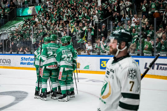 Rögles Mattias Göransson och Linus Sjödin jublar