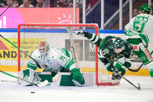 Rögles målvakt Arvid Holm och Färjestads Joel Kellman
