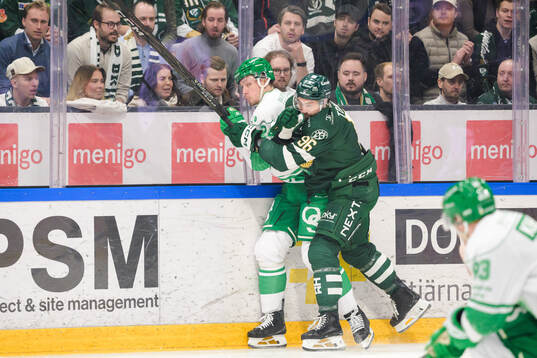 Rögles Mattias Göransson  och Färjestads David Tomasek