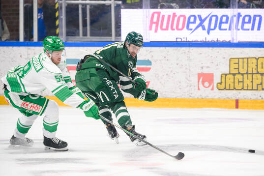 Rögles Filip Johansson och Färjestads Joakim Nygård