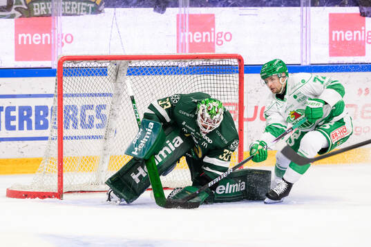 Färjestads målvakt Emil Larmi och Rögles Daniel Zaar