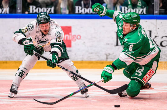 Färjestads Joel Kellman och Rögles Paul Ladue