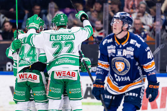 Rögles spelare jublar