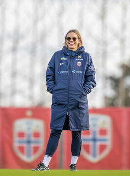 Carina Olset Hovda, press officer of the Norwegian women's