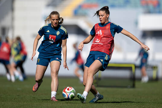 Smilla Holmberg and Bella Andersson at a training session