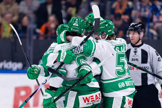 Rögles spelare jublar