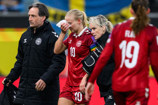 Pernille Harder of Denmark recieves medical attention