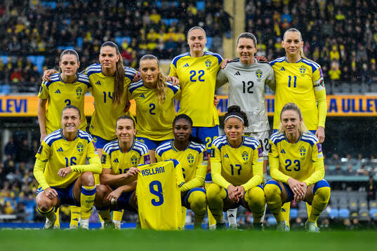 The starting eleven of Sweden pose for a photo