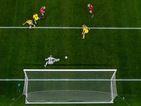 Pernille Harder of Denmark scores 1-1 past Julia Zigiotti