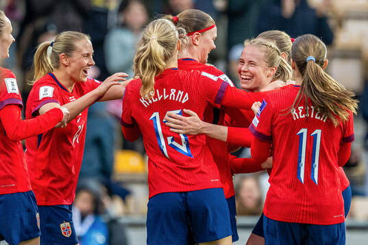 Julie Blakstad of Norway celebrates with Lisa Naalsund,