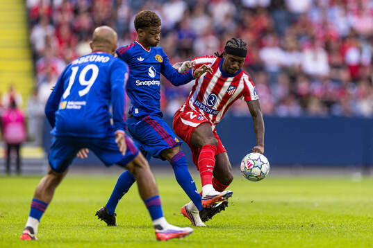 Amad of Manchester United and Ademola Lookman of Atletico