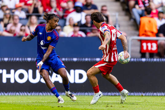 Leny Yoro of Manchester United and Arnau Sola of Atletico
