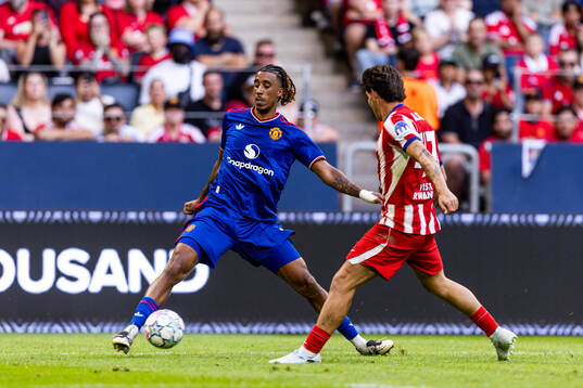 Leny Yoro of Manchester United and Arnau Sola of Atletico
