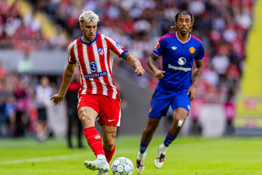 Matteo Ruggeri of Atletico de Madrid and Leny Yoro of
