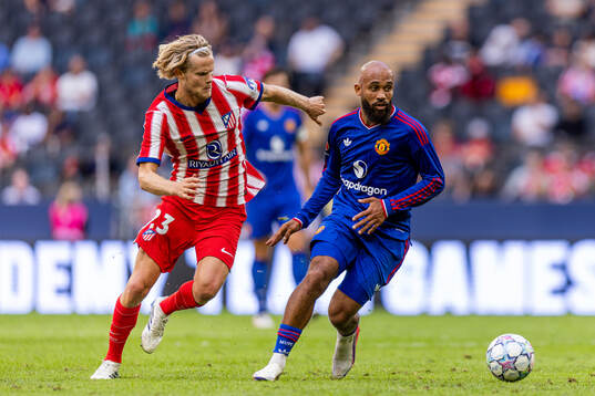 Hjulmand of Atletico de Madrid and Bryan Mbeumo of