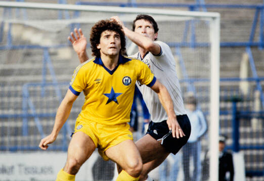  Kevin Keegan of Newcastle against Mike Doyle of Bolton.