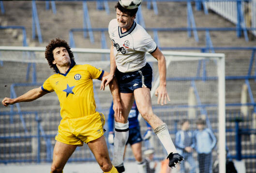  Kevin Keegan of Newcastle against Mike Doyle of Bolton.