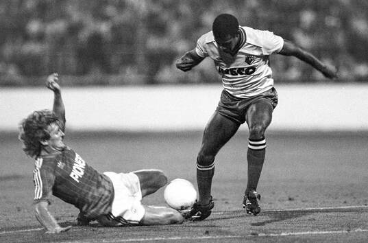  Russel Osman of Ipswich tackles John Barnes of Watford.   