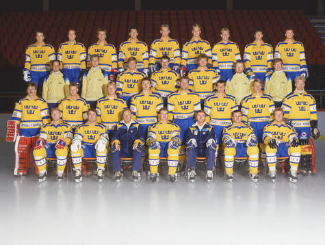 Players and team staff of Sweden pose for a team photo
