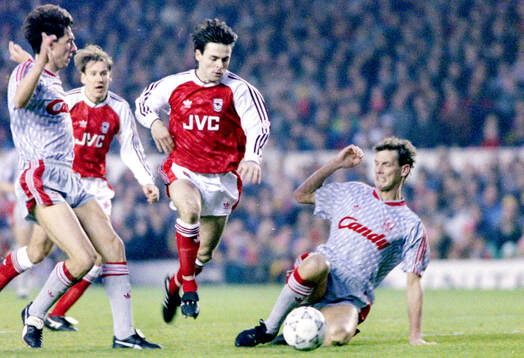  Arsenals Anders Limpar against Liverpools Gary Ablett and Barry Venison.